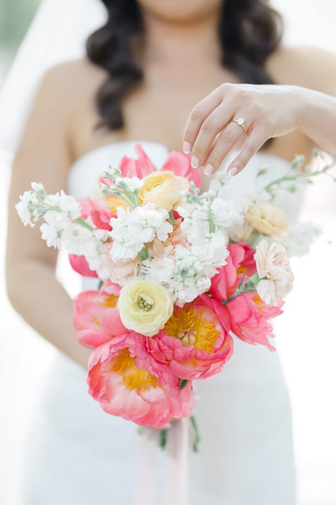 Bride holding her bouquet of flowers on her wedding day