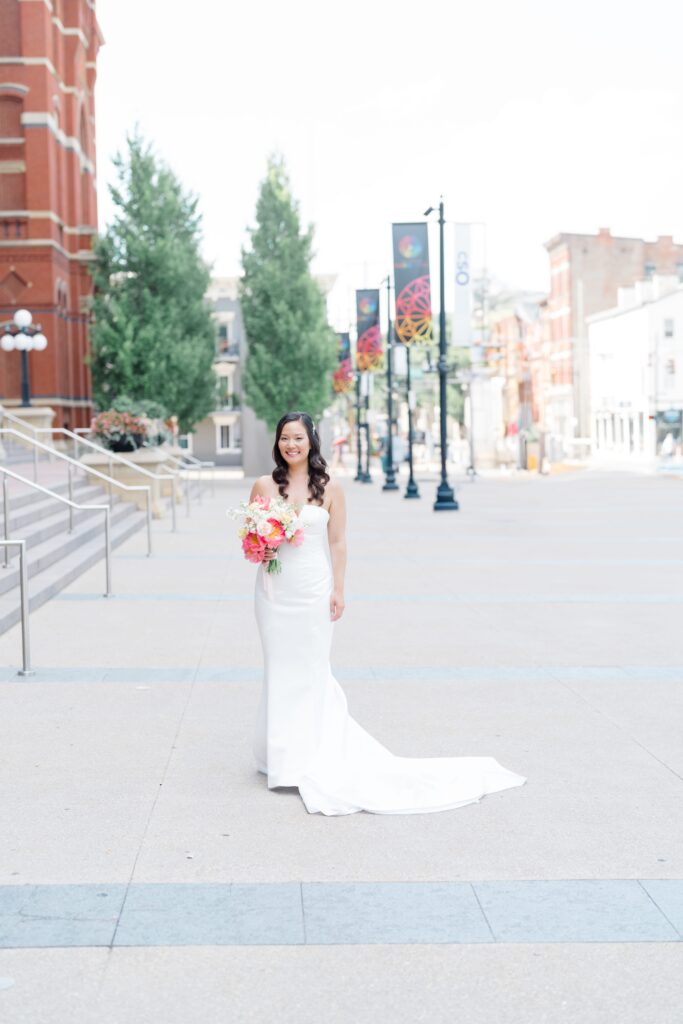 Bride posing for a photo at Cincinnati Music Hall