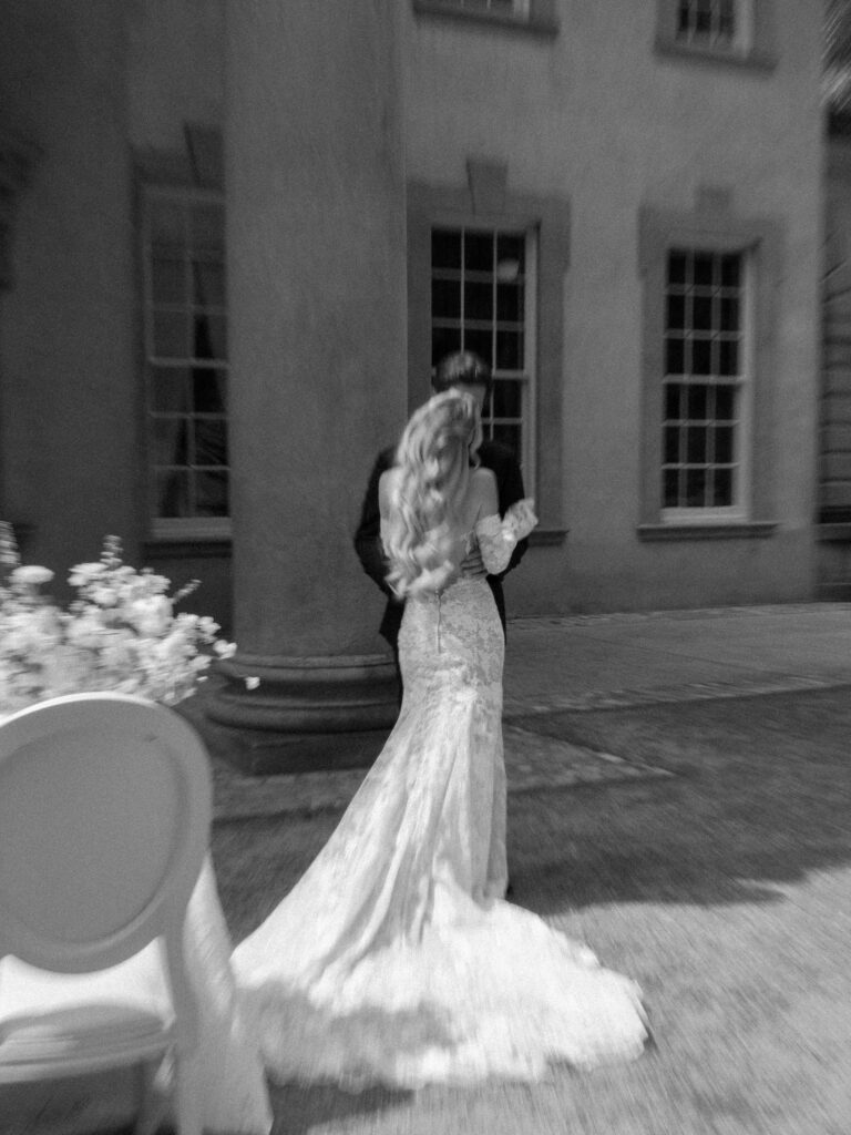 Black and white wedding portrait with grand columns at The Swan House Atlanta Georgia