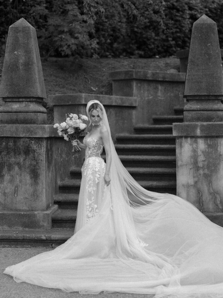 Luxury bridal portrait at The Swan House in Atlanta Georgia with dramatic veil and editorial styling